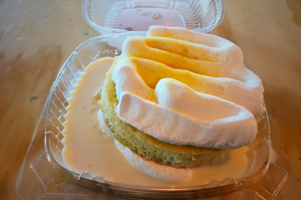 Tres Leches in a plastic container